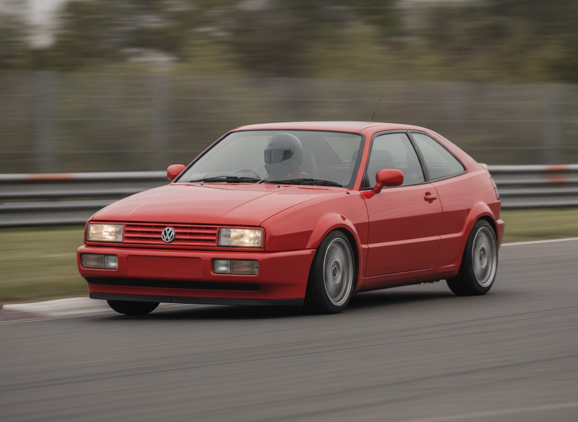 Red Volkswagen Corrado G60 being driven hard through a corner on a race circuit