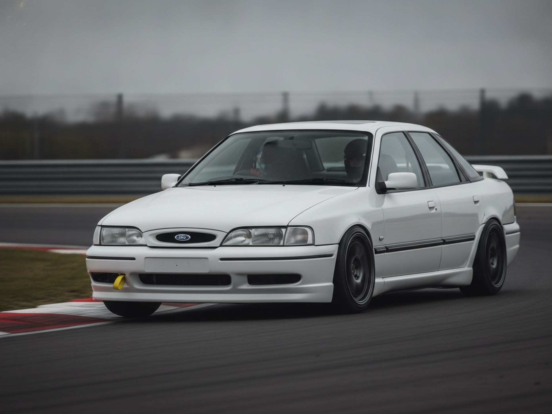 White Ford Scorpio Series 1 on a race circuit, driver in a plain black helmet, big brake kit guide